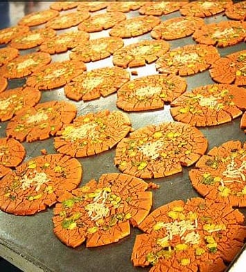 Sohan a brittle sweets Iran. These products have been popular in the history of the Ottoman Empire. Sohan baked in central Iran. The sweetness of the egg, cardamom, rose water, flour, wheat germ, cooked saffron and pistachio and almond powder. Sohan has a sweet taste is crisp. Iran's daily production is 20 tons Sohan. These products are generally produced in several forms. We prepare here Sohan as plate form in kinds of packaging.